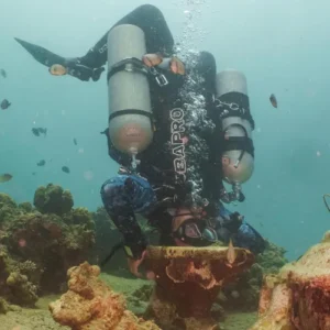 jon sidemount with his head in a toilet