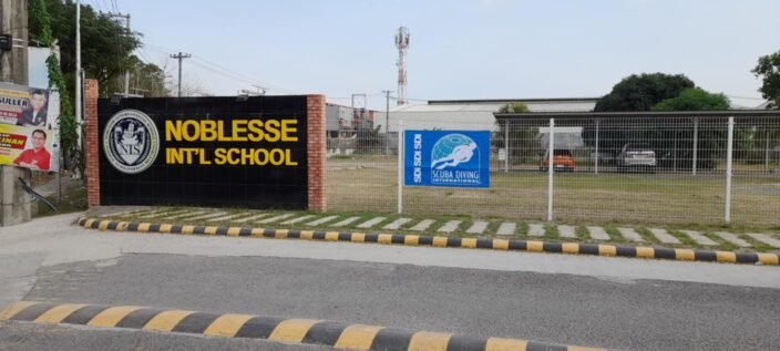 SDI Scuba Diving International flag displayed at Noblesse International School in Subic — Baz's dive centre. SDI provided the flag without hesitation.