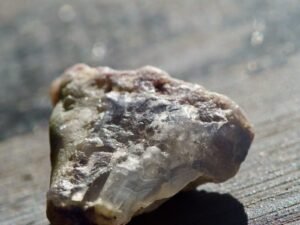 Clear quartz crystal point catching the light